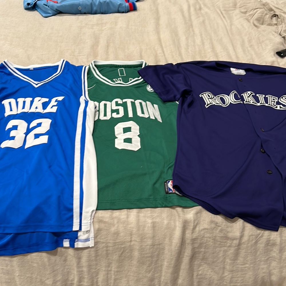 A group of jerseys. Barely worn